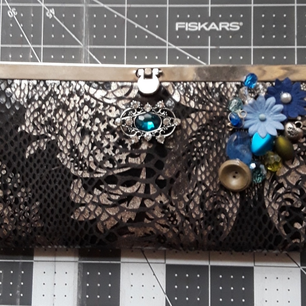 Upcycled black and gold clutch. Beaded and one of